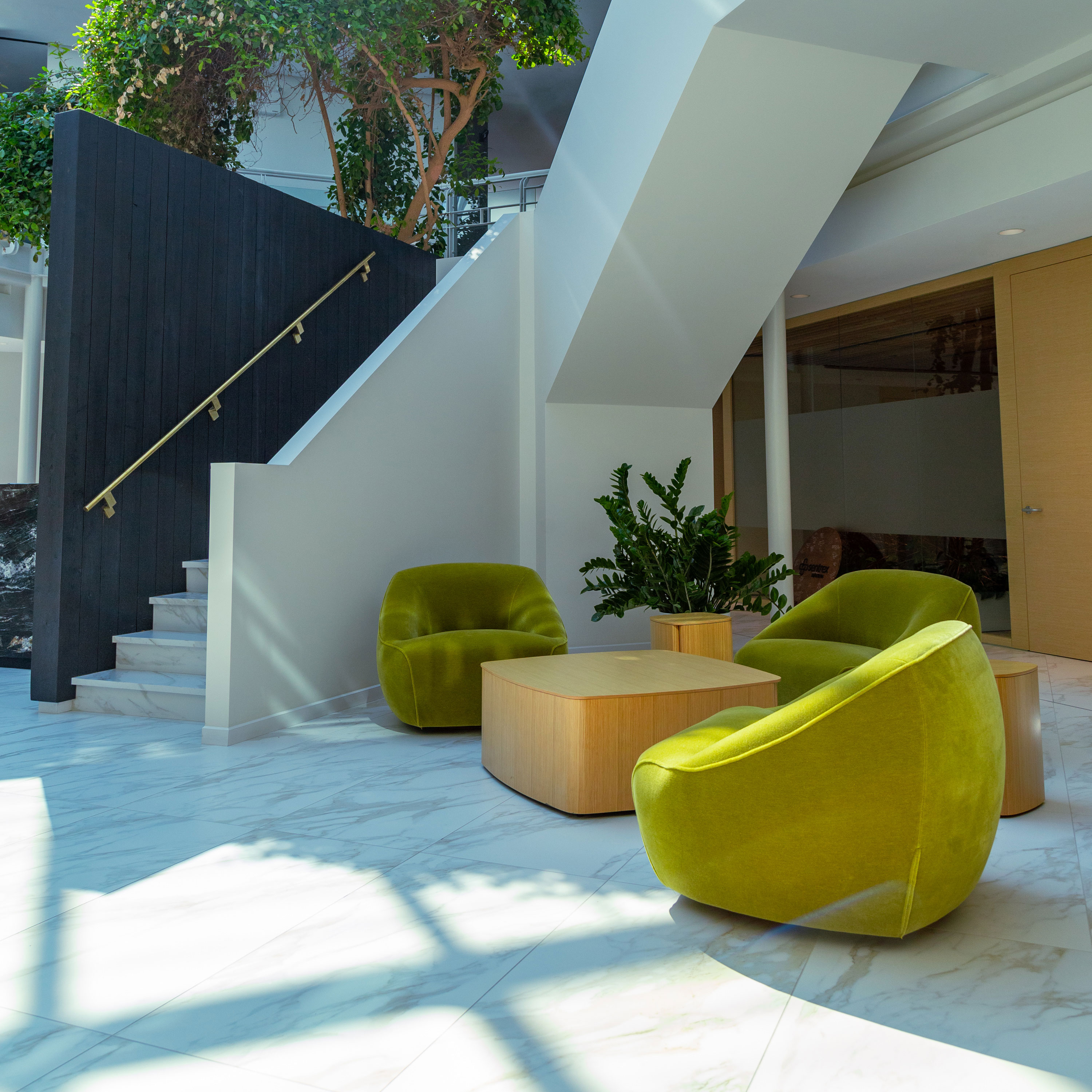 Modern office space with seating and natural light