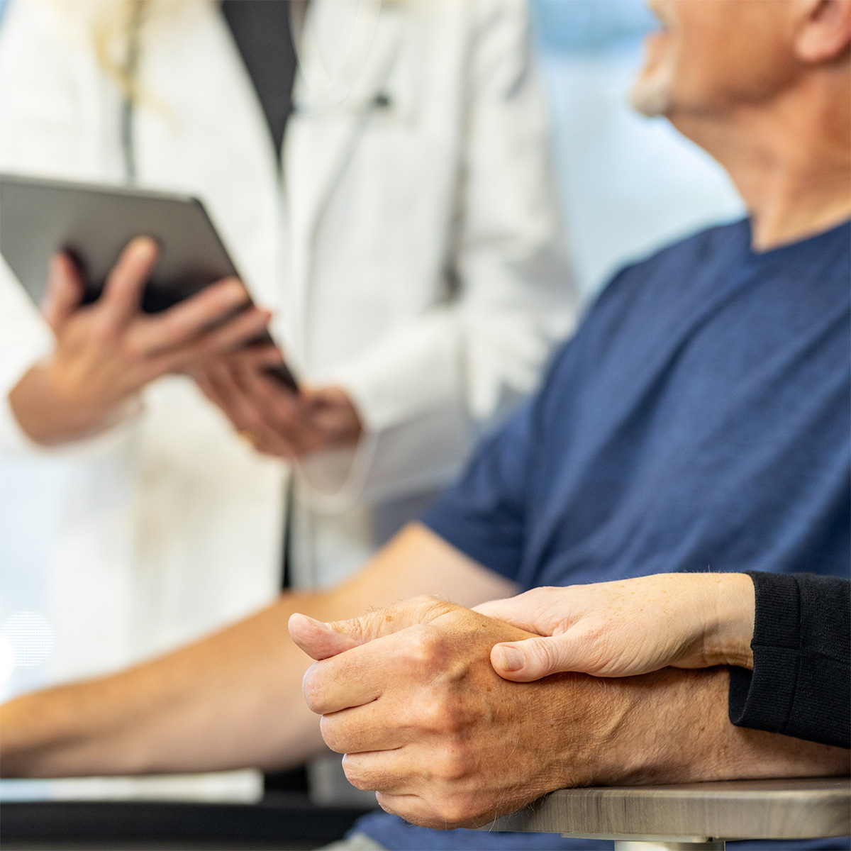 Infirmière PerCuro avec un patient